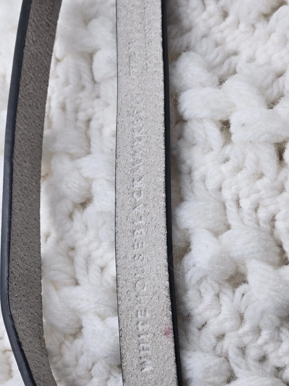 White House Black Market leather belt featuring a silver-tone buckle.